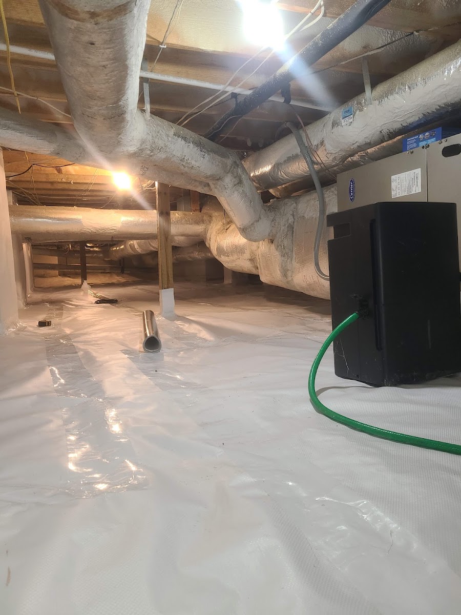 Hixon HVAC maintenance work in a Grayson-area crawlspace