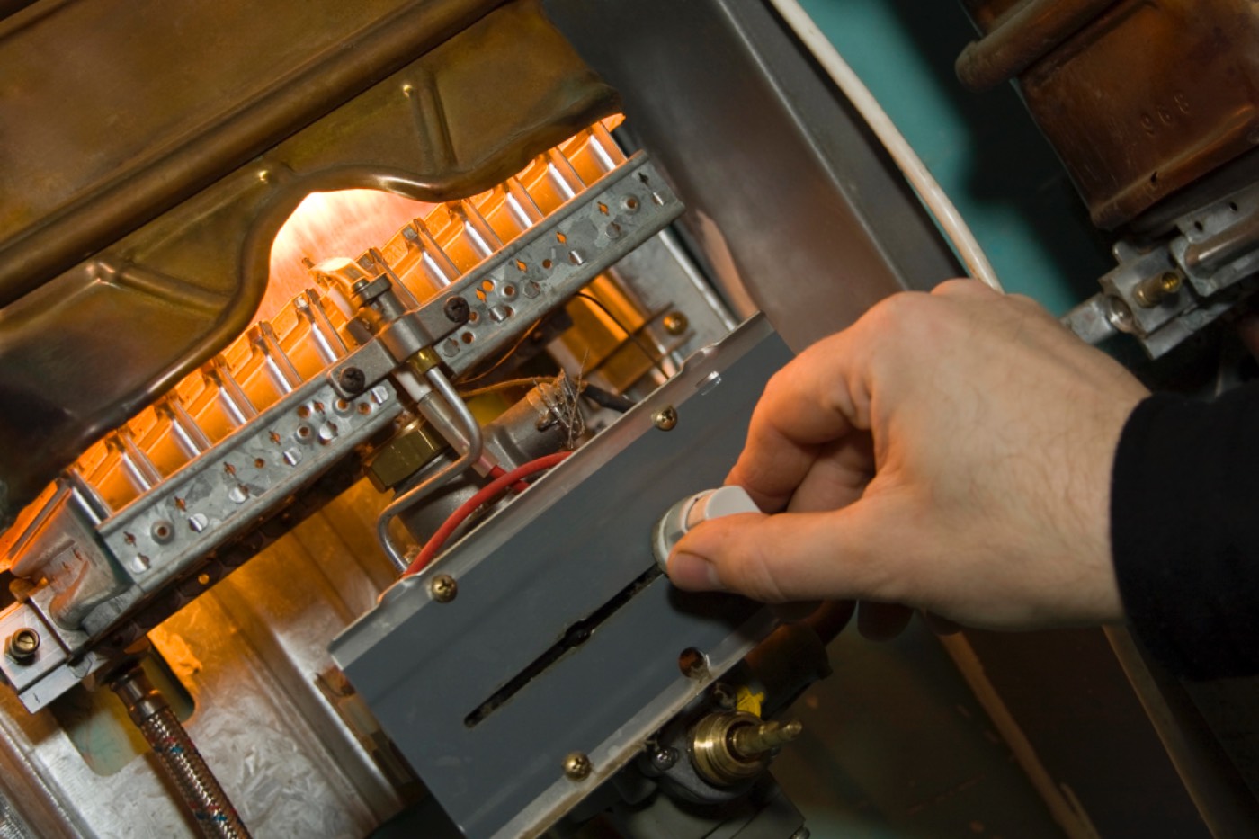 Close-up of a Hixon technician servicing a gas furnace near Grayson, GA